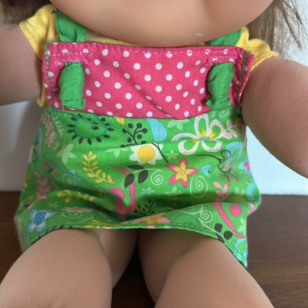 Cabbage Patch Doll With Pig Rail and Green Dress - Picture 3 of 13